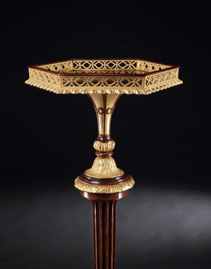 Thomas Chippendale - A pair of parcel gilt rosewood torchères | MasterArt
